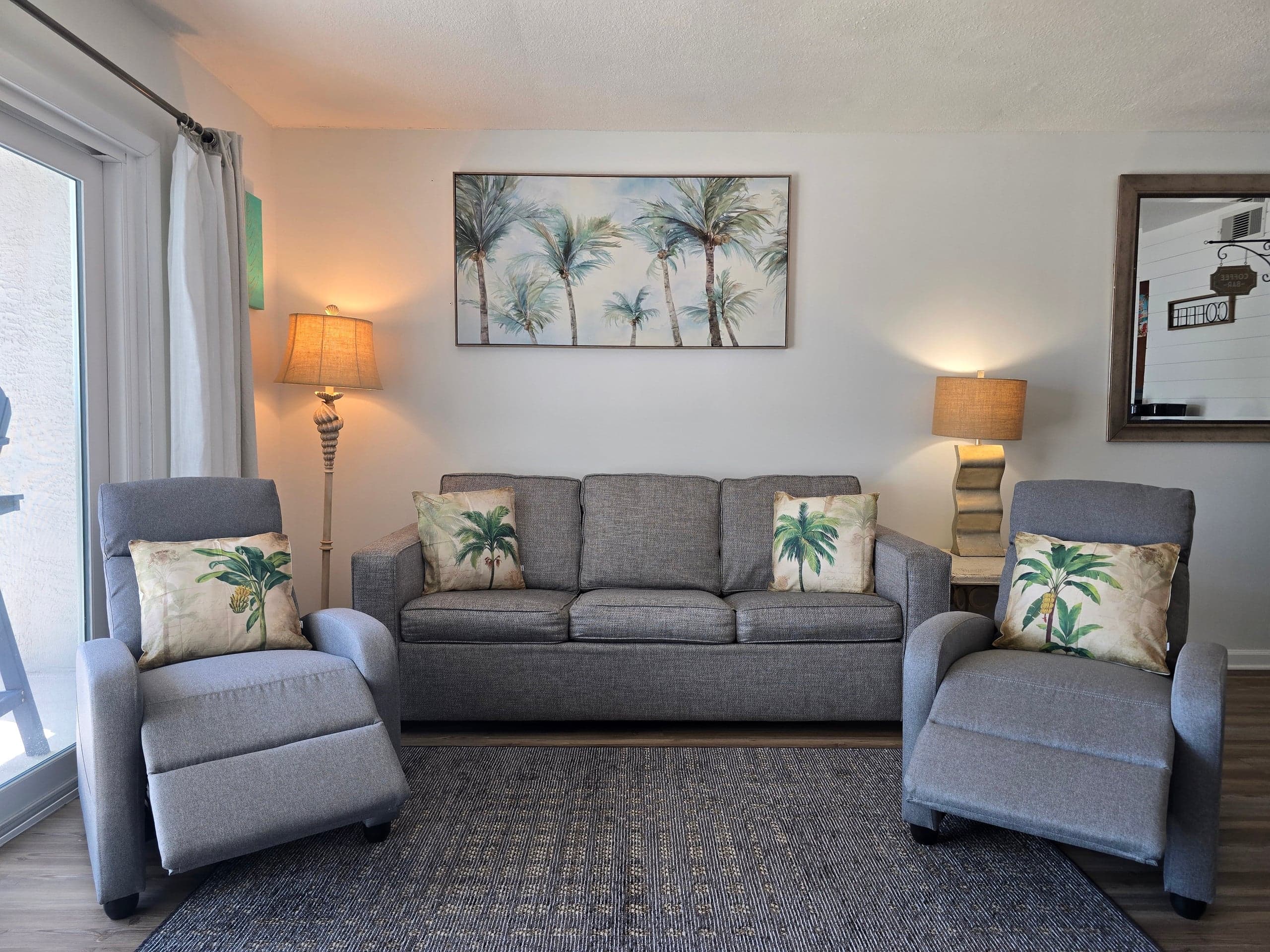 Queen size sleeping sofa and 2 recliners in the living room. Summit 209, The Summit.
